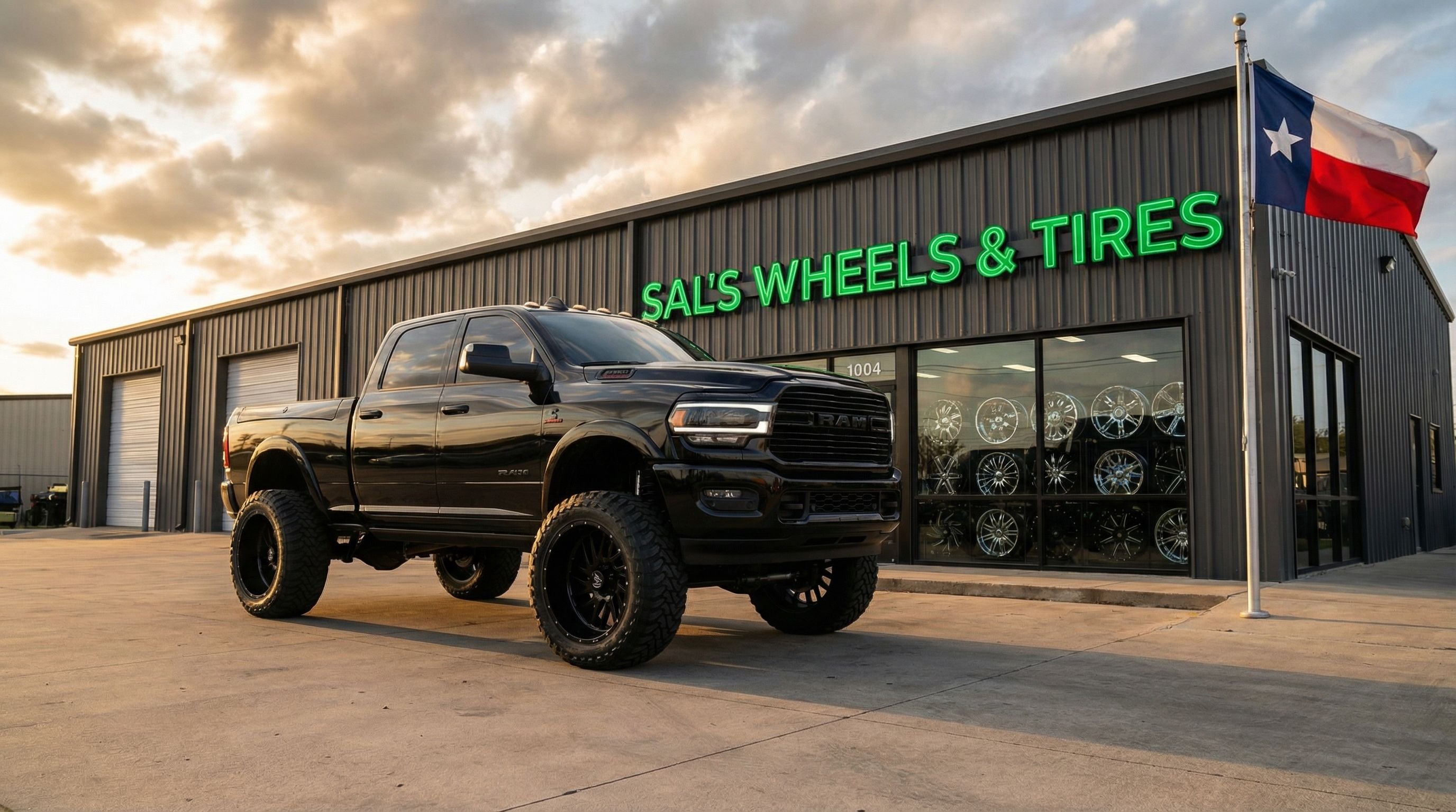 Sal's Wheels & Tires shop front - lifted Ram truck with custom wheels, Crowley TX